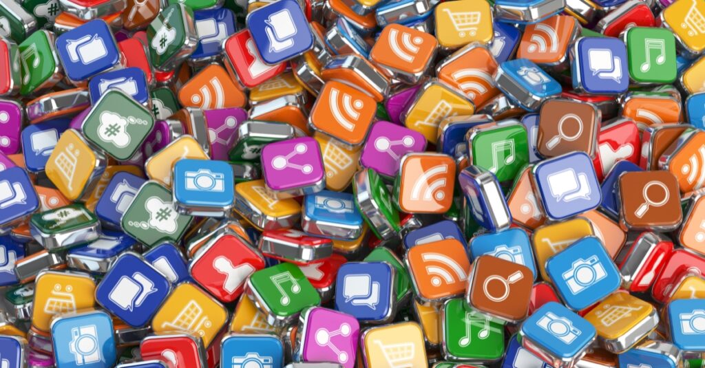 A colorful pile of 3D app icons representing various digital tools and platforms, symbolizing the complexity and diversity of a modern tech stack for financial advisors